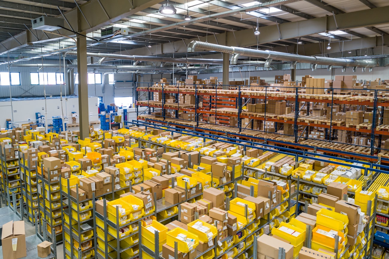 Pallets of boxed stock in a warehouse